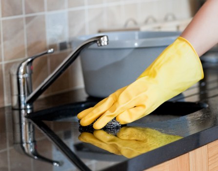 Supervisor monitoring safe carpet cleaning practices