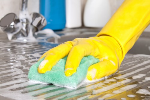 Local cleaners preparing a flat for move in around SE3